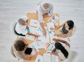 team-work-hands-or-creative-business-people-in-a-meeting-planning-a-logo-branding-or-marketing-co.jpg